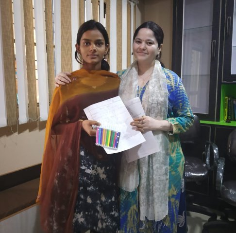 Director ma'am falicitating a student