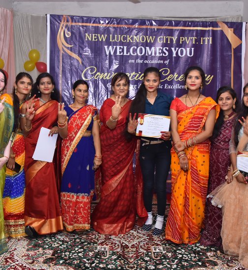 Female students receving certificates from guest of honor