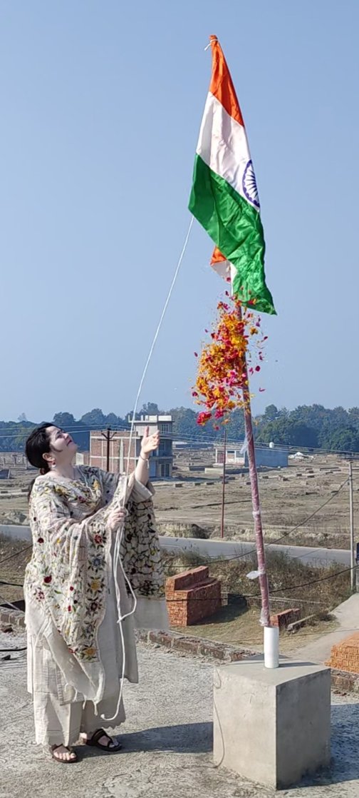 Principal madam doing flag hoisting on Independence Day